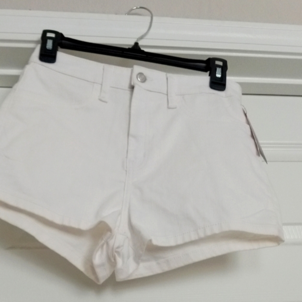 Ladies short shorts brand new with tags . 4 pockets white denim size 6.